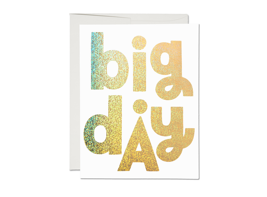 Greeting card with 'big day' text in gold glitter on a white background