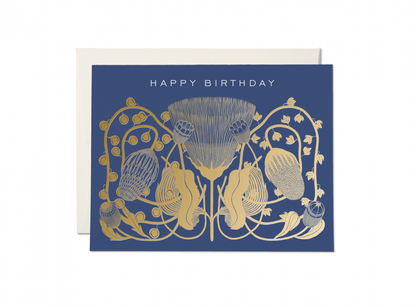 Blue birthday card with gold floral design and white 'Happy Birthday' text